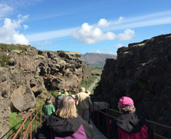 Our group walking between two vertical rock walls